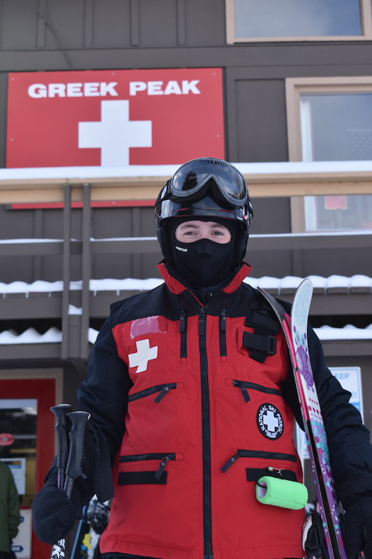 Kelley in ski patrol vest at Greek Peak